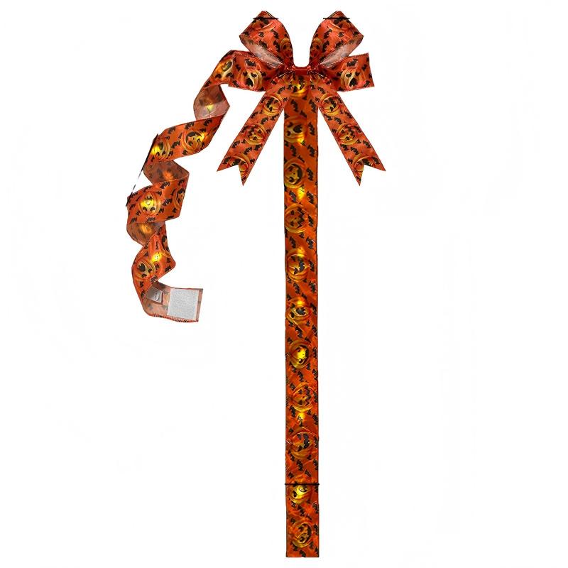 LED illuminated Halloween bow for cabinets
